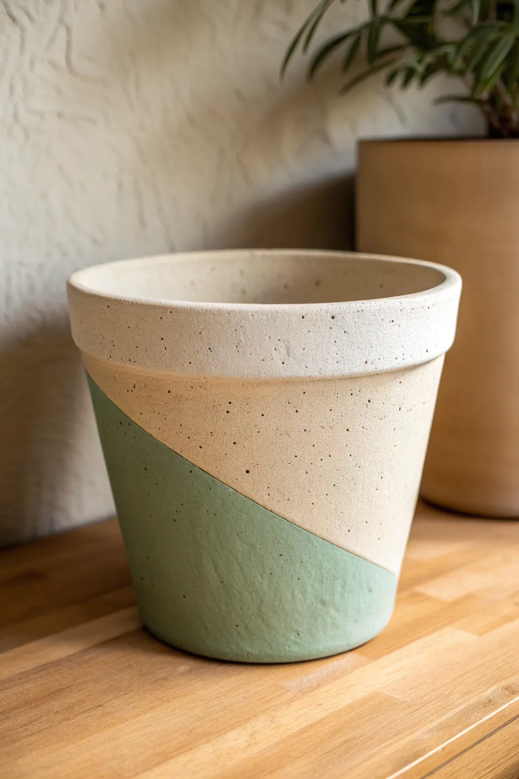 Modern color-blocked clay pot in matte neutrals for an easy, chic DIY shelf upgrade.