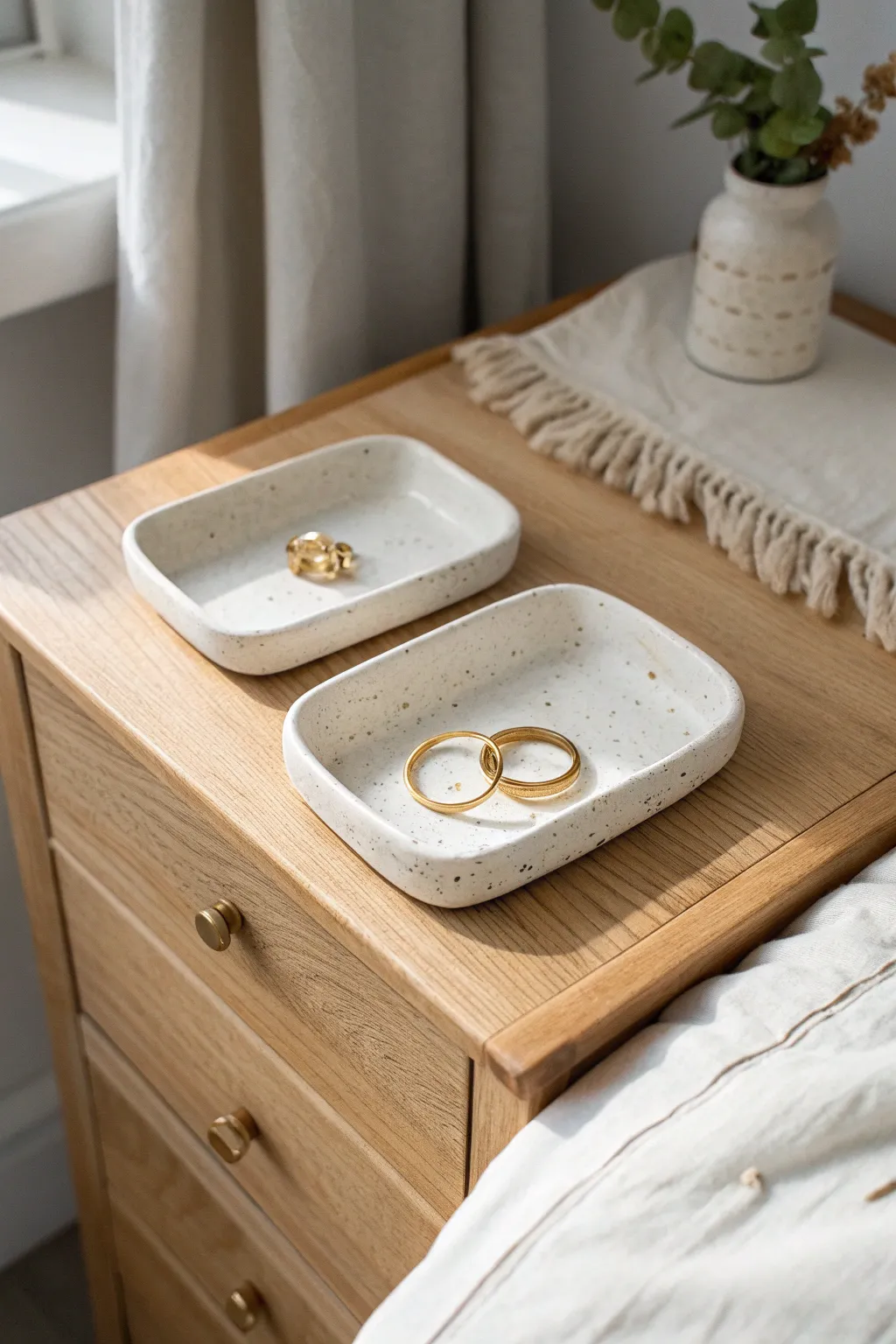 Clean-lined slab trinket trays in soft neutrals, perfect for rings and bedside essentials