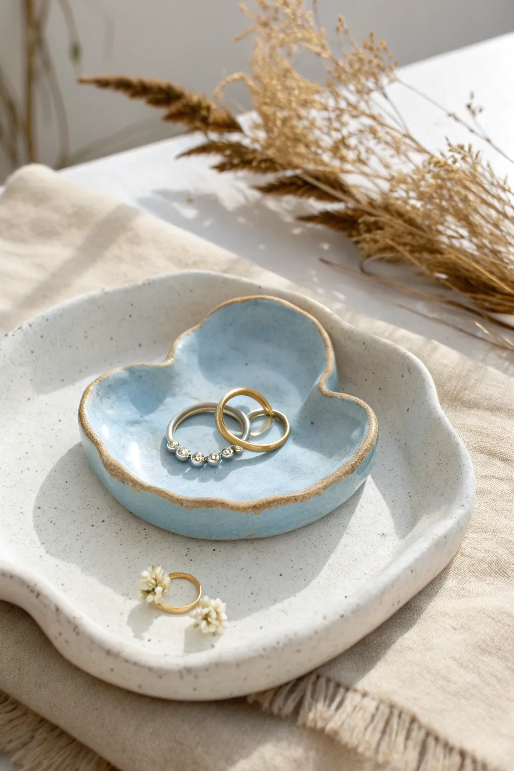 Sky-blue cloud jewelry dish with soft white highlights, perfect for rings and tiny treasures.