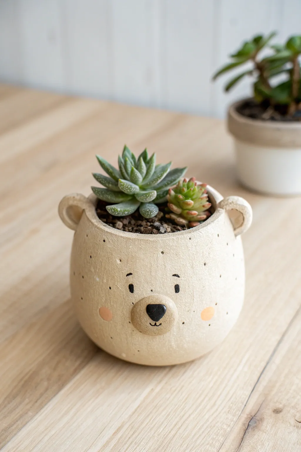 Tiny bear buddy pot in warm neutrals, styled minimal with a mini succulent for cozy charm.
