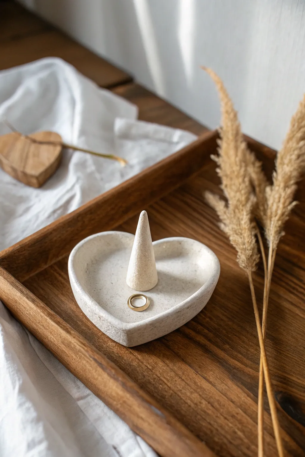 Sweet clay date idea: a matte heart ring holder that keeps jewelry tidy on your nightstand.