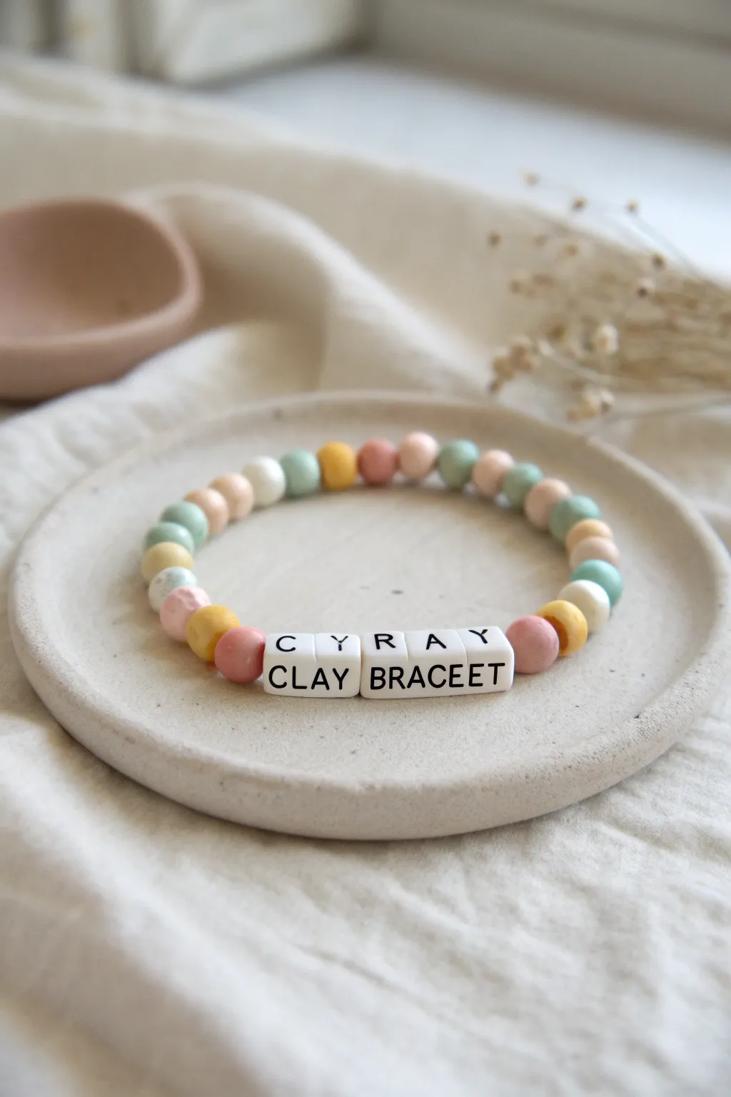 Minimal pastel clay bead name bracelet with crisp letter beads, perfect for girls and gifting.