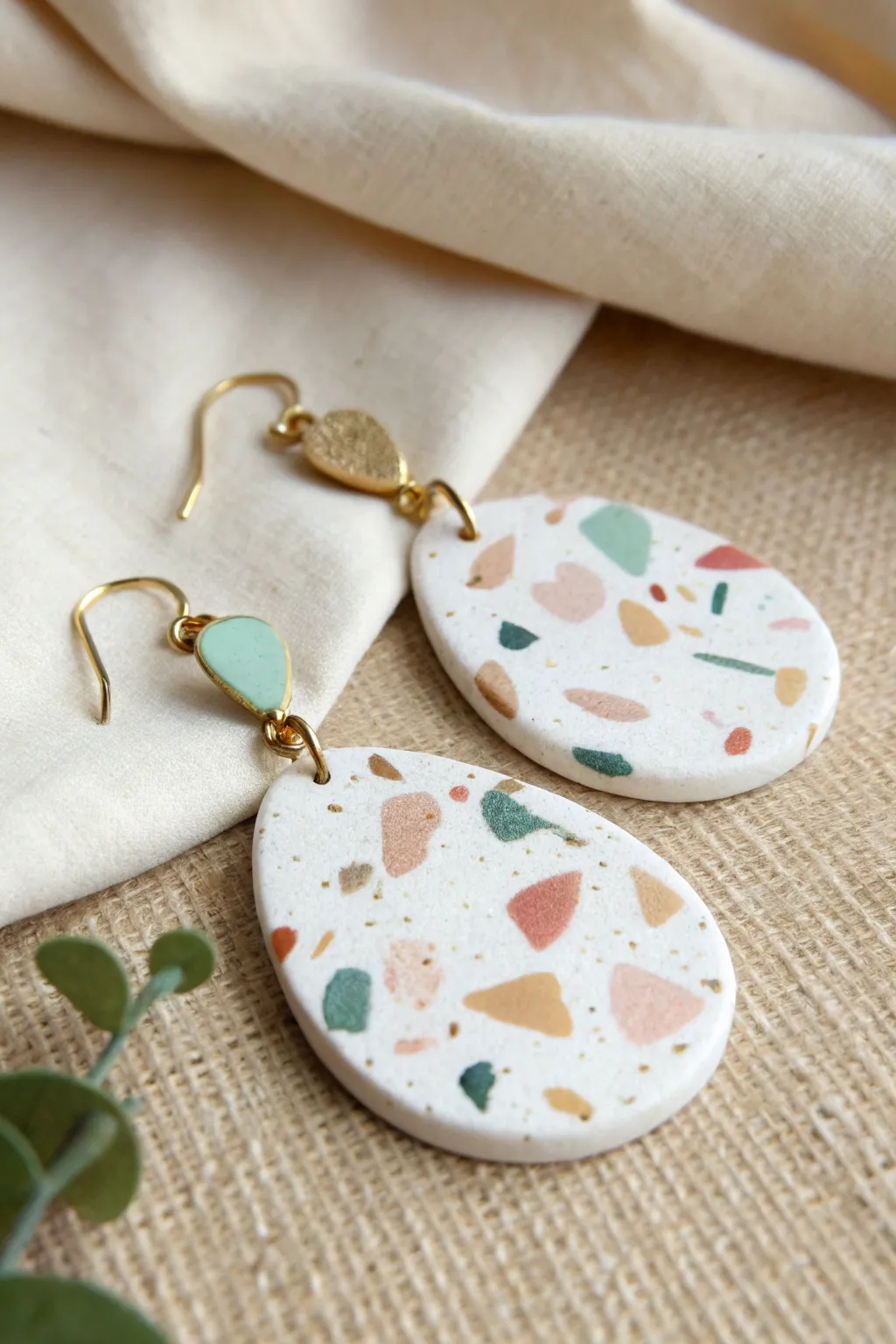 Terrazzo confetti polymer clay drop earrings with a minimalist boho vibe and soft contrast.