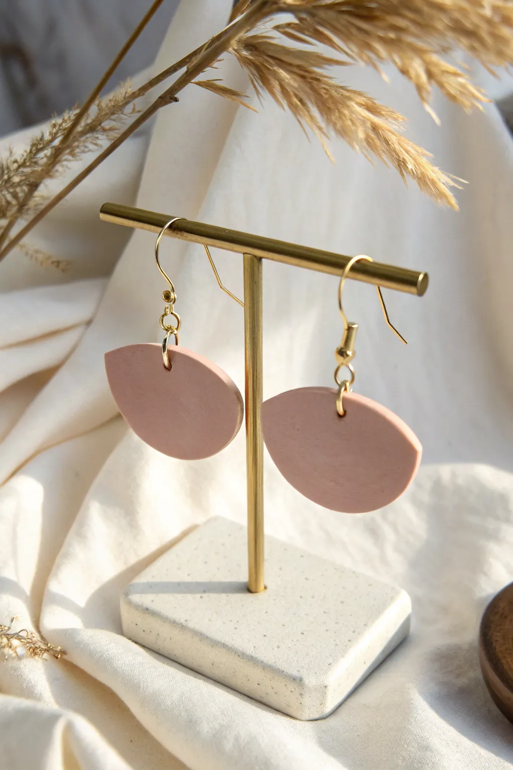 Minimal half moon polymer clay drops in dusty pink, a chic beginner project with clean lines.