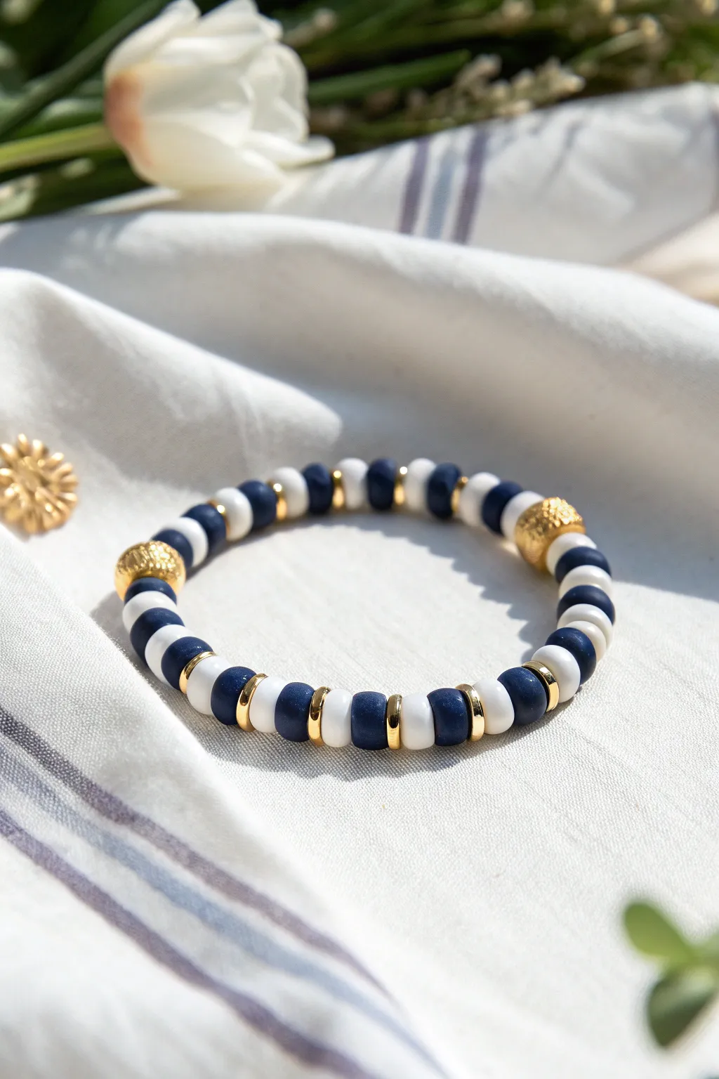 Navy, white, and gold clay bead bracelet for a clean preppy tennis club stripe look