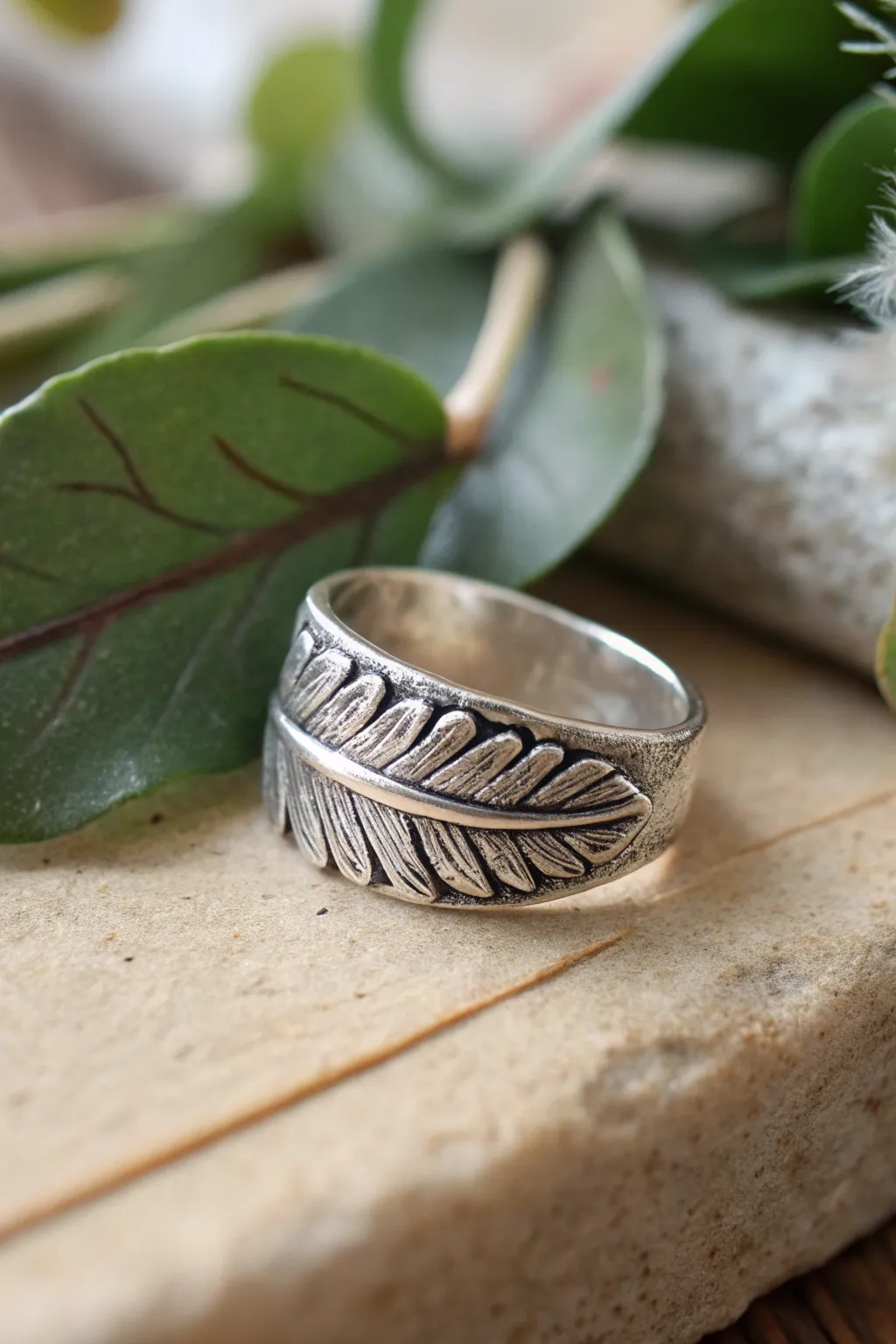 Delicate silver clay leaf wrap ring with darkened veins for a simple, nature-inspired finish.