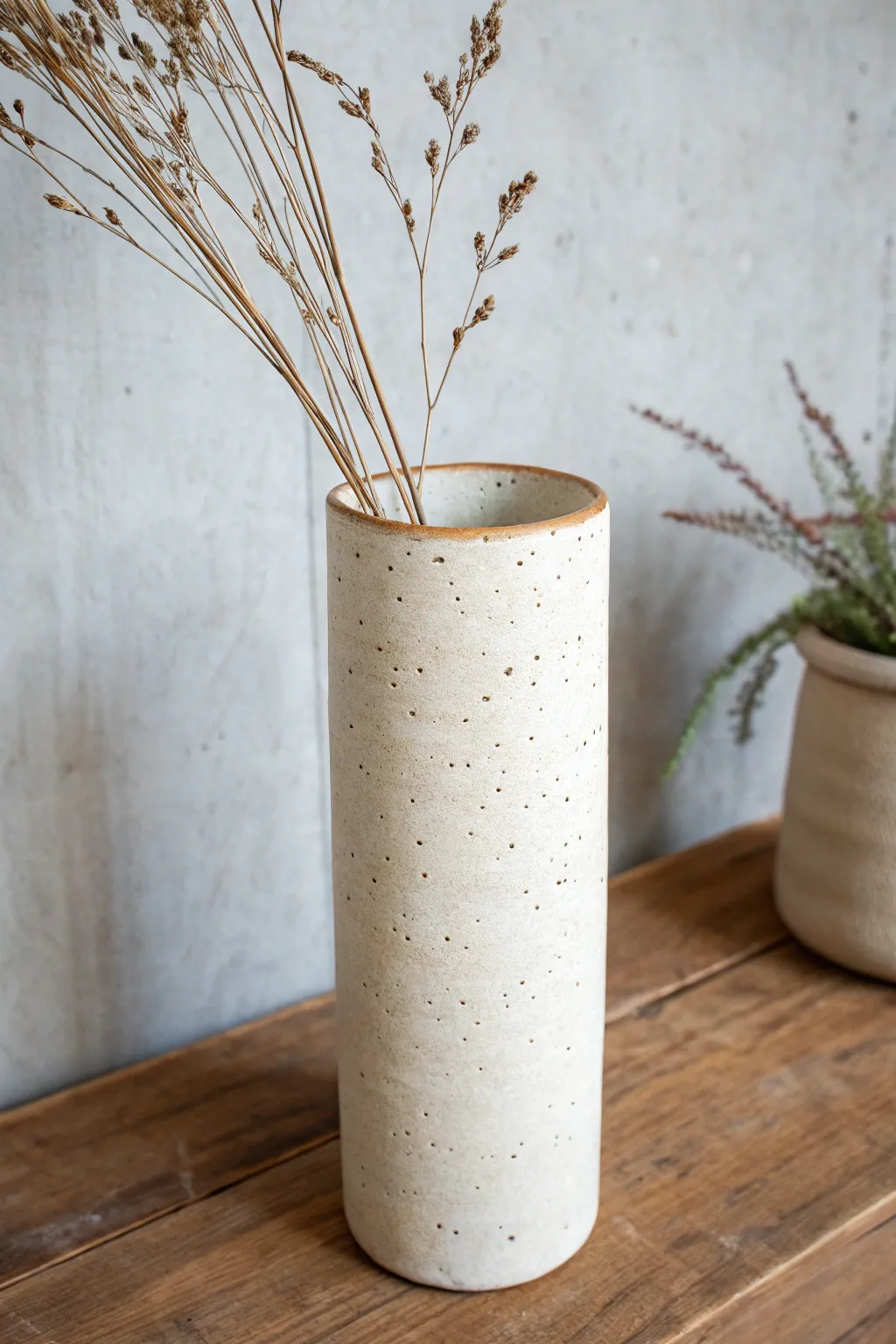 Soft slab cylinder vase with an elegant overlapped seam and minimal boho stems