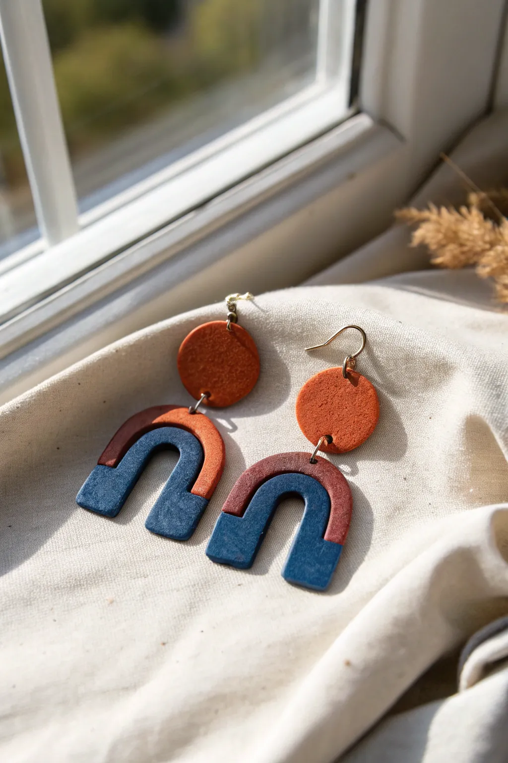 Bold arch-and-circle air-dry clay earrings in two-tone color, perfect for teen statement style