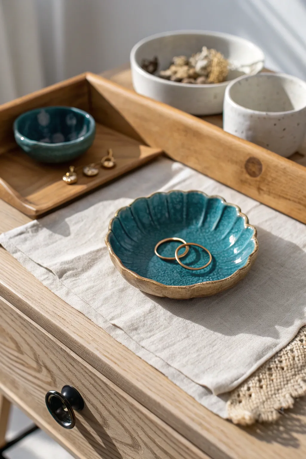 Tiny handmade trinket dish keeps rings and pins tidy in a chic minimalist boho corner.