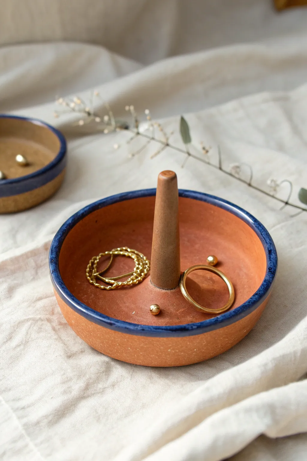 Clay dish and center post combo for hoops, studs, and rings, minimalist with a boho touch.