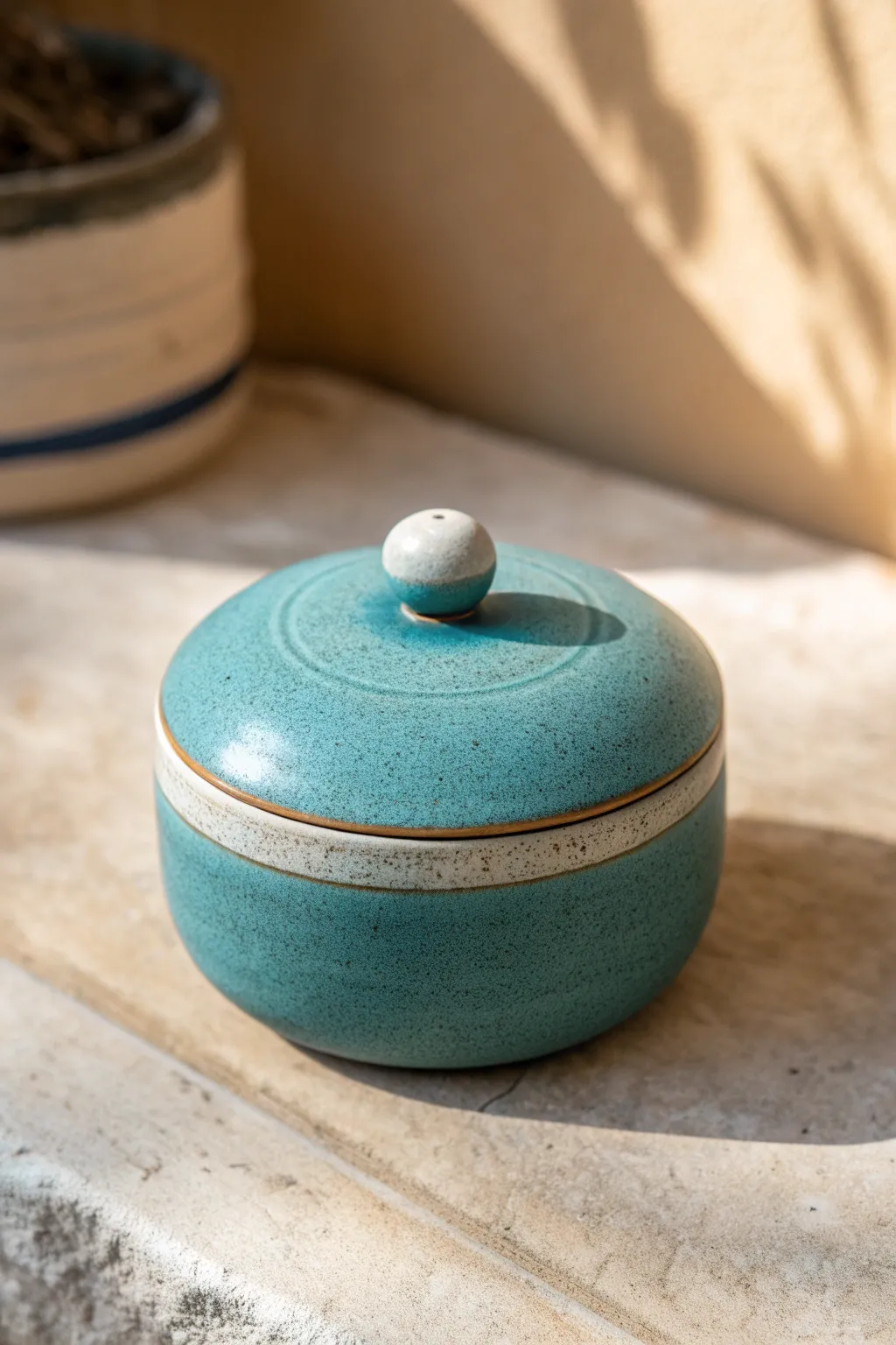 Minimal round clay jewelry box with a simple knob lid pull in bold teal, beginner friendly.