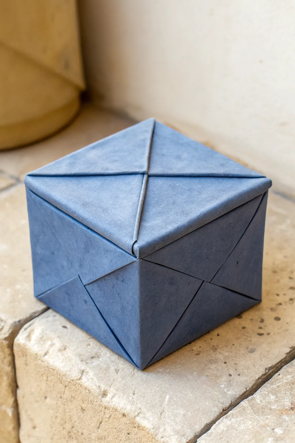 Origami-style one-piece slab box in matte indigo, showcasing clean folds and handmade simplicity.
