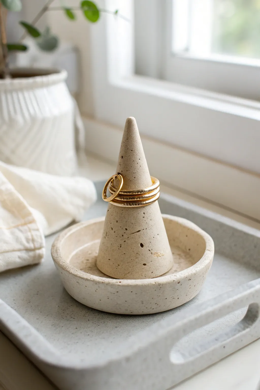 Minimal air dry clay ring cone holder in warm neutral tones, simple, chic, and DIY-friendly