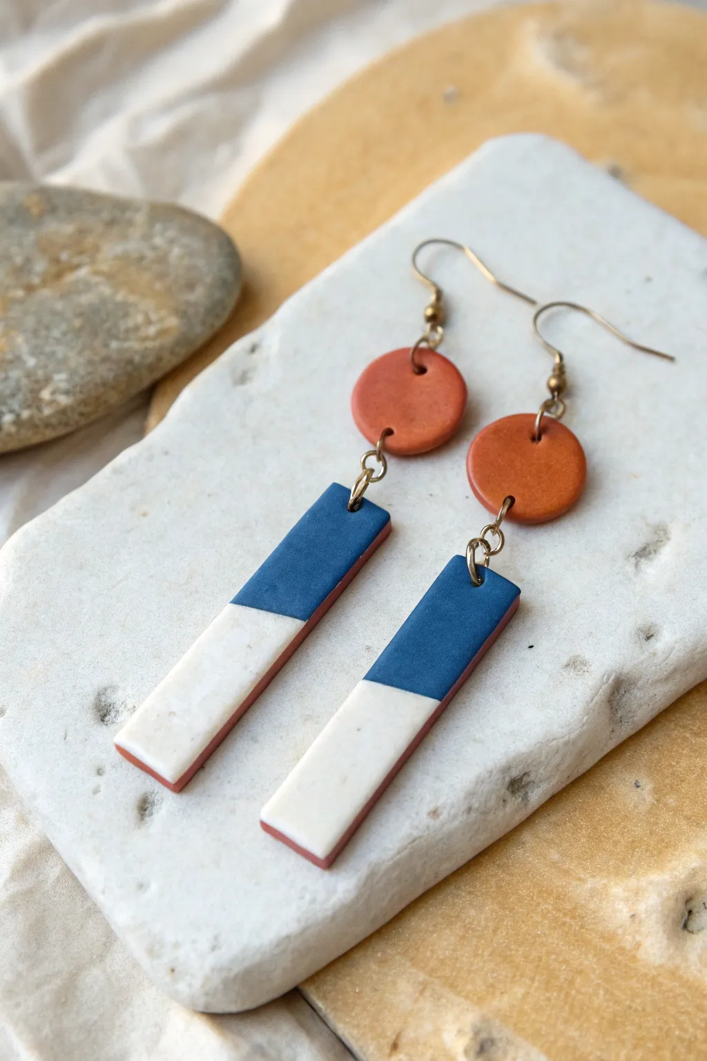 Clean rectangle drop earrings in bold color-blocking, minimalist lines, and handmade clay texture.