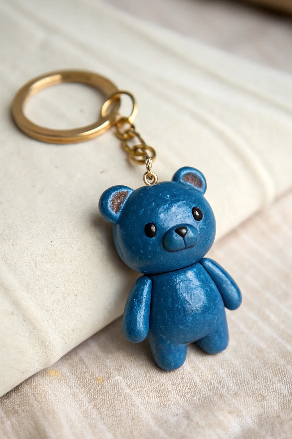 Sweet chibi bear keychain charm in bold glaze, minimalist and handmade for your daily carry.