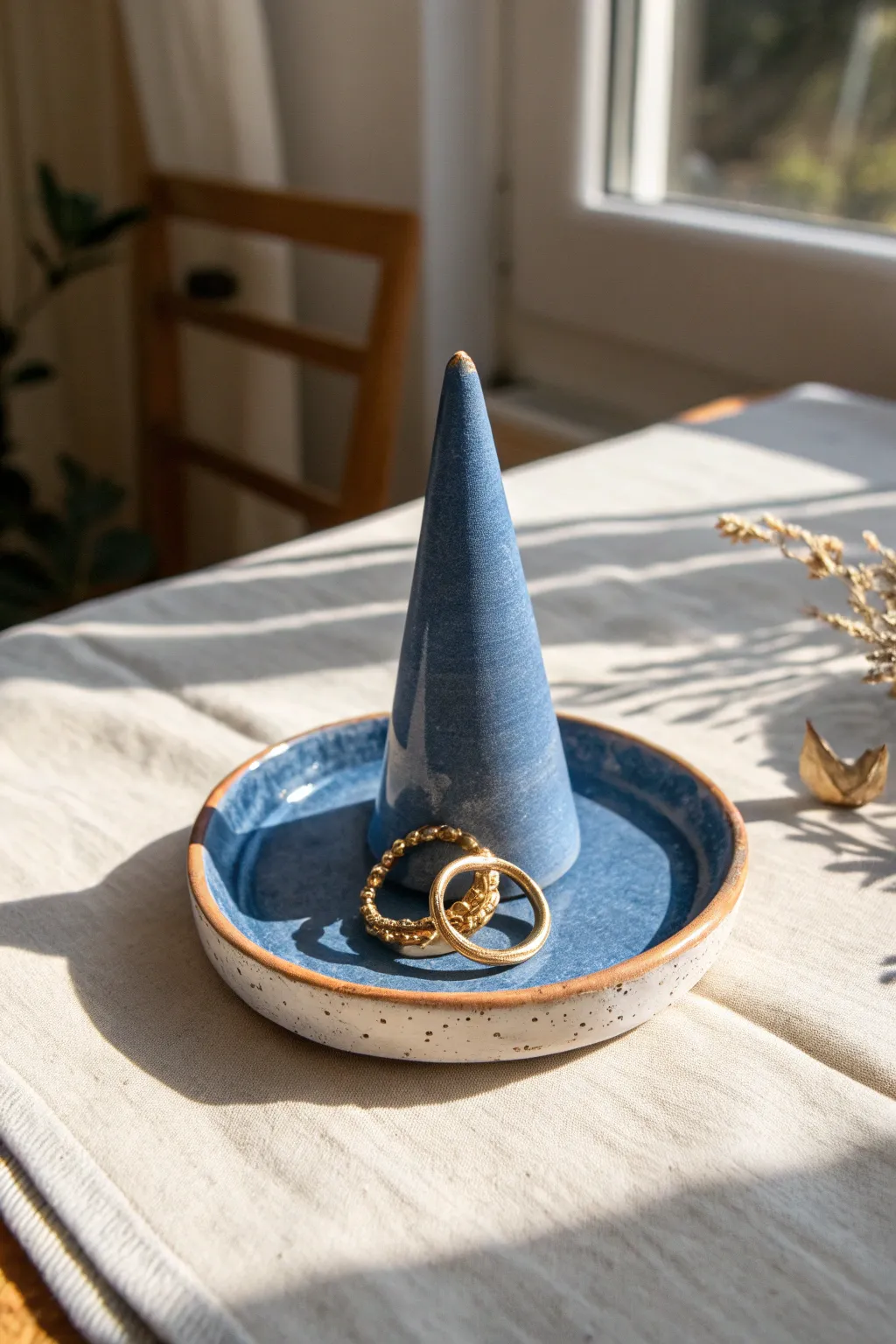 Thumb-pressed clay cone ring holder in bold cobalt, minimalist boho styling for your favorite rings.