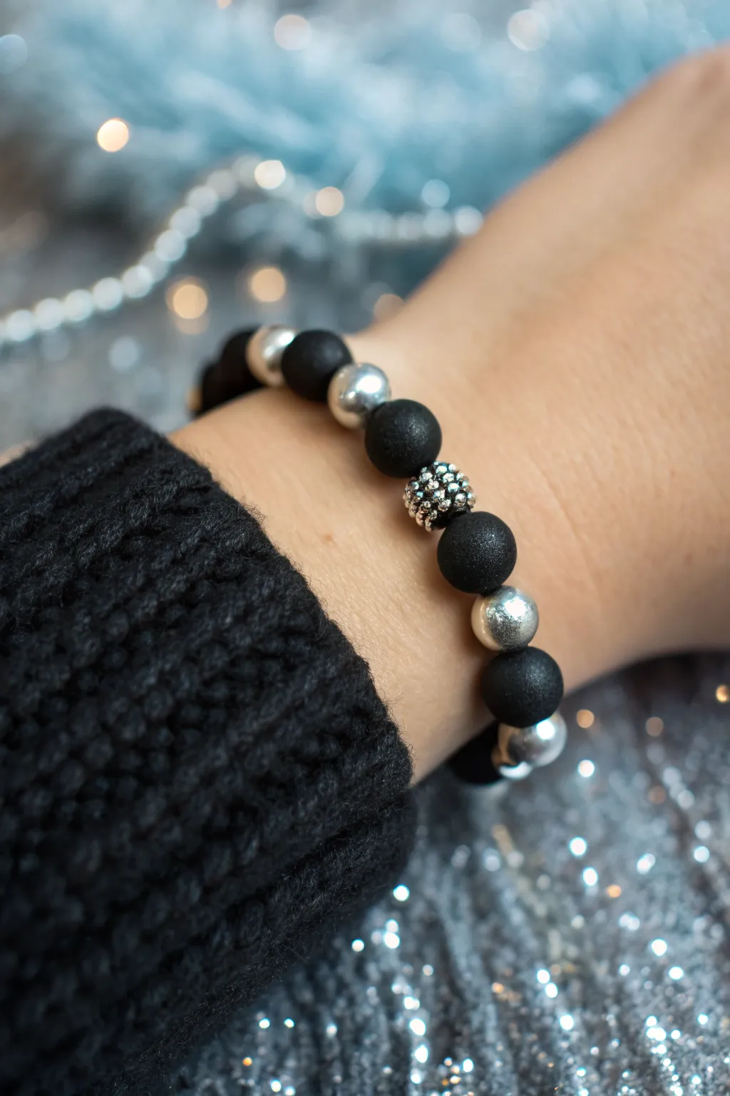 New Year’s Eve sparkle: matte black clay beads with silver spacers for an elegant midnight look.