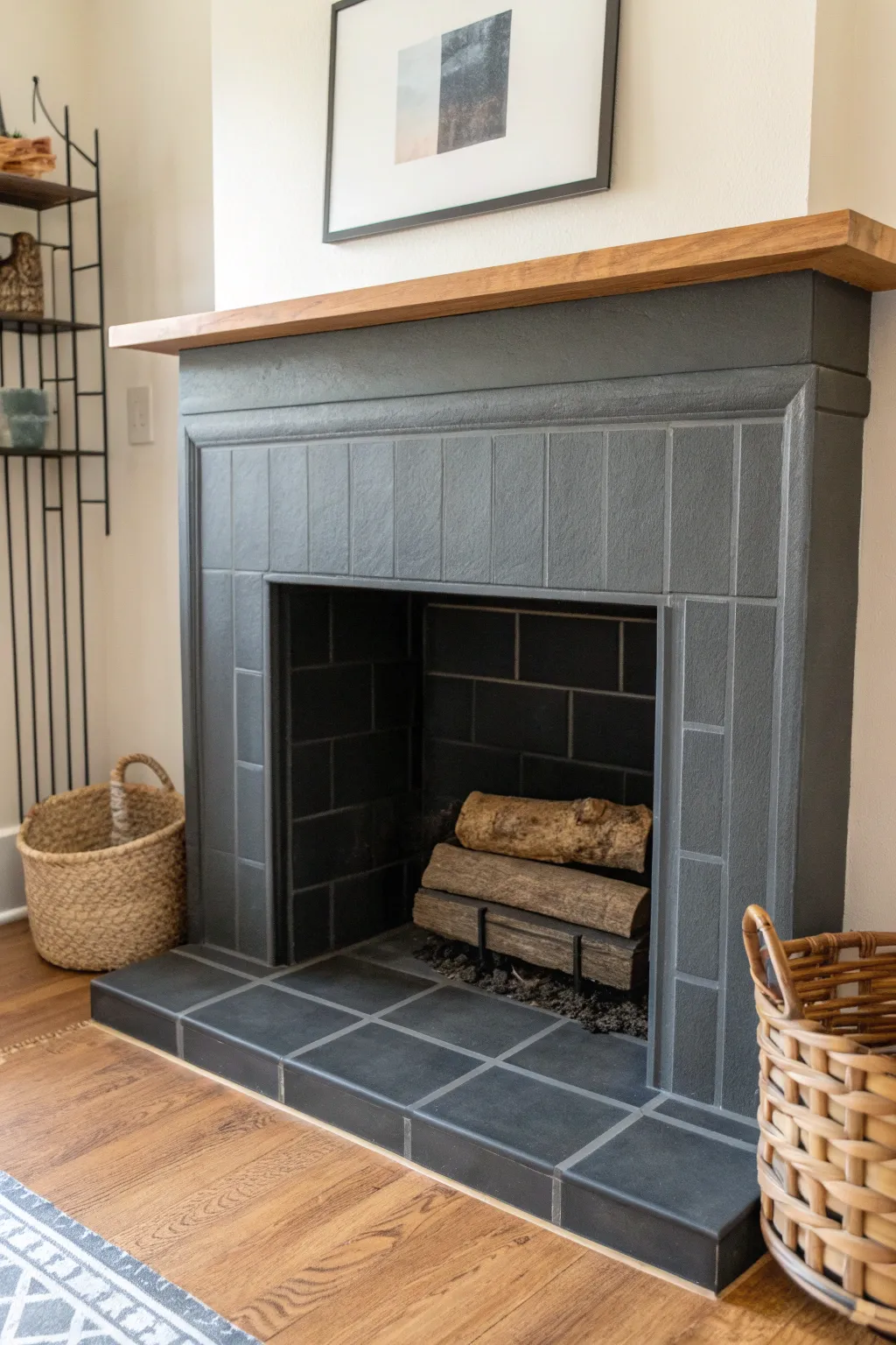 Charcoal tiles with a darker edge hide soot and elevate your hearth in minimalist style.