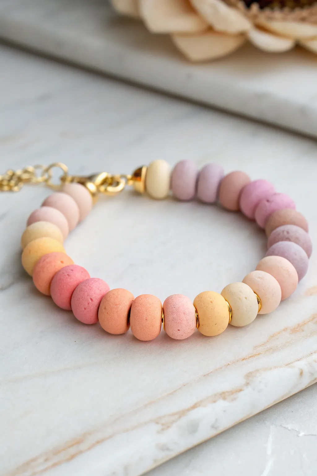Sorbet ombre clay bead bracelet fading from yellow to lilac for a soft, modern pastel pop.