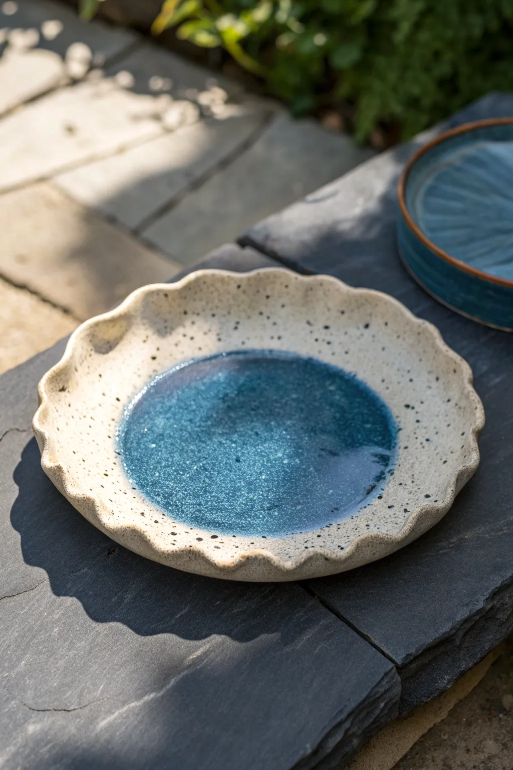 Organic wavy-edge platter with speckled glaze, Scandi-minimal with a soft boho feel.