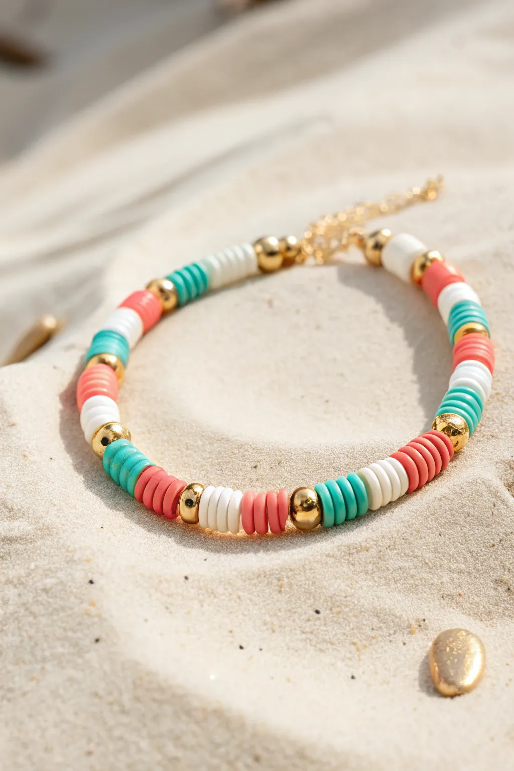 Gold spacer heishi bracelet in bright summer colors for an elevated preppy look