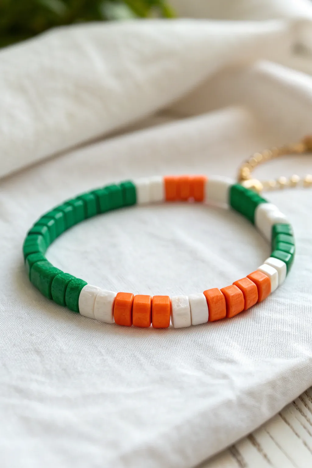 St Patricks Day bracelet idea: clay heishi beads in bold Irish flag green, white, orange blocks.