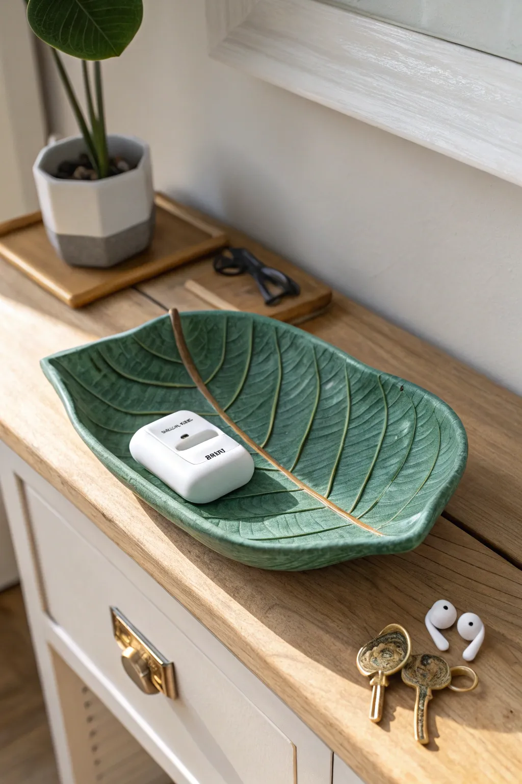 Leaf-shaped air dry clay catchall tray adds handmade charm to your entryway essentials.