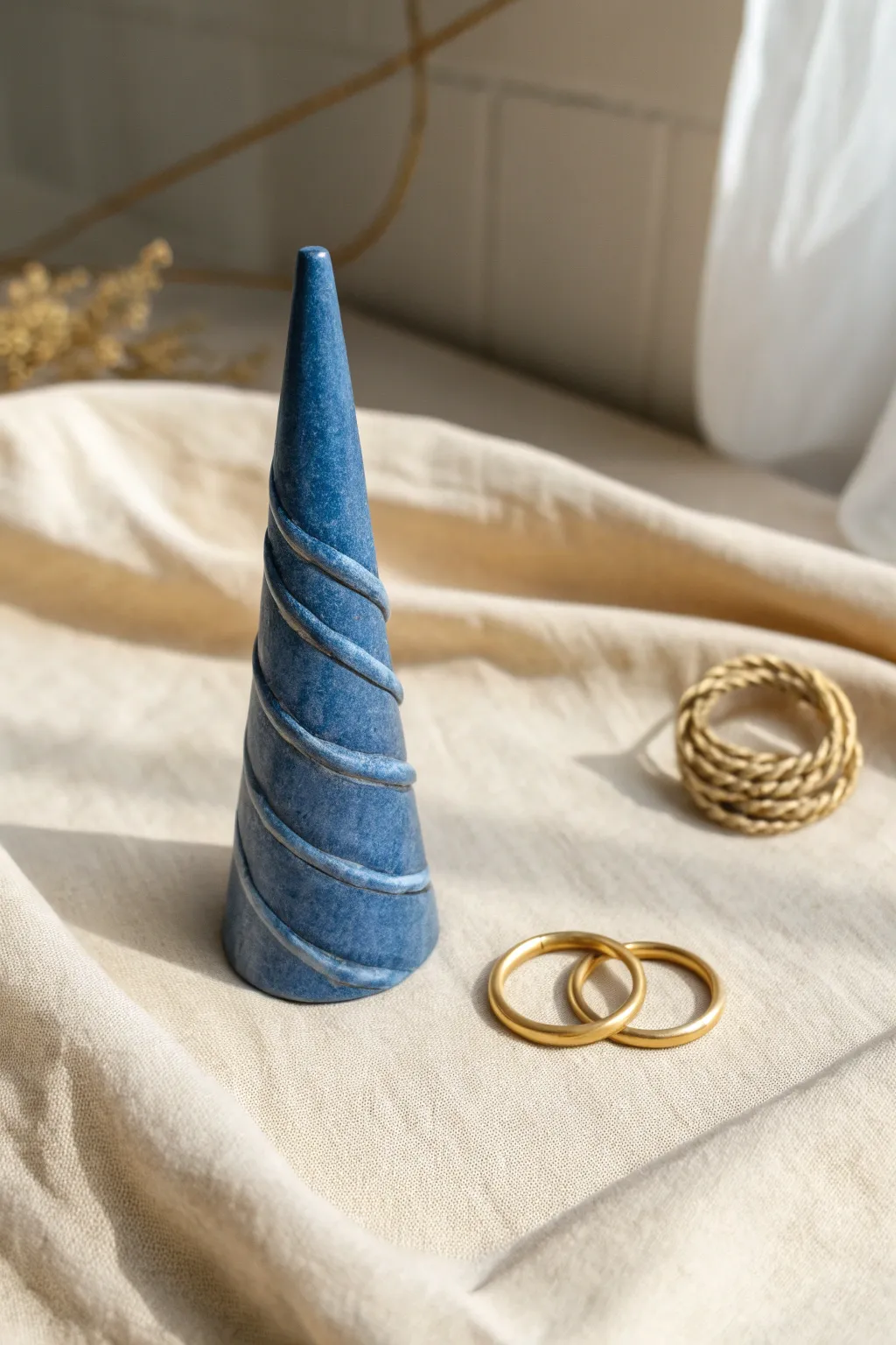 Bold cobalt twist-cone ring holder in handmade clay, a minimal boho accent for your jewelry