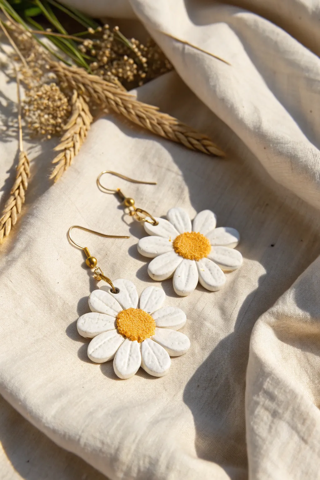 Bright daisy statement earrings in air dry clay, a simple sunny DIY with Scandinavian charm.