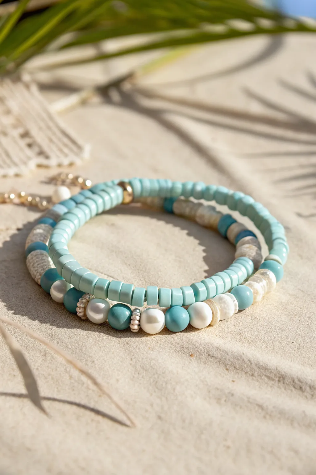 Mermaid-cool clay heishi bracelet with delicate pearls for an airy summer stack vibe.