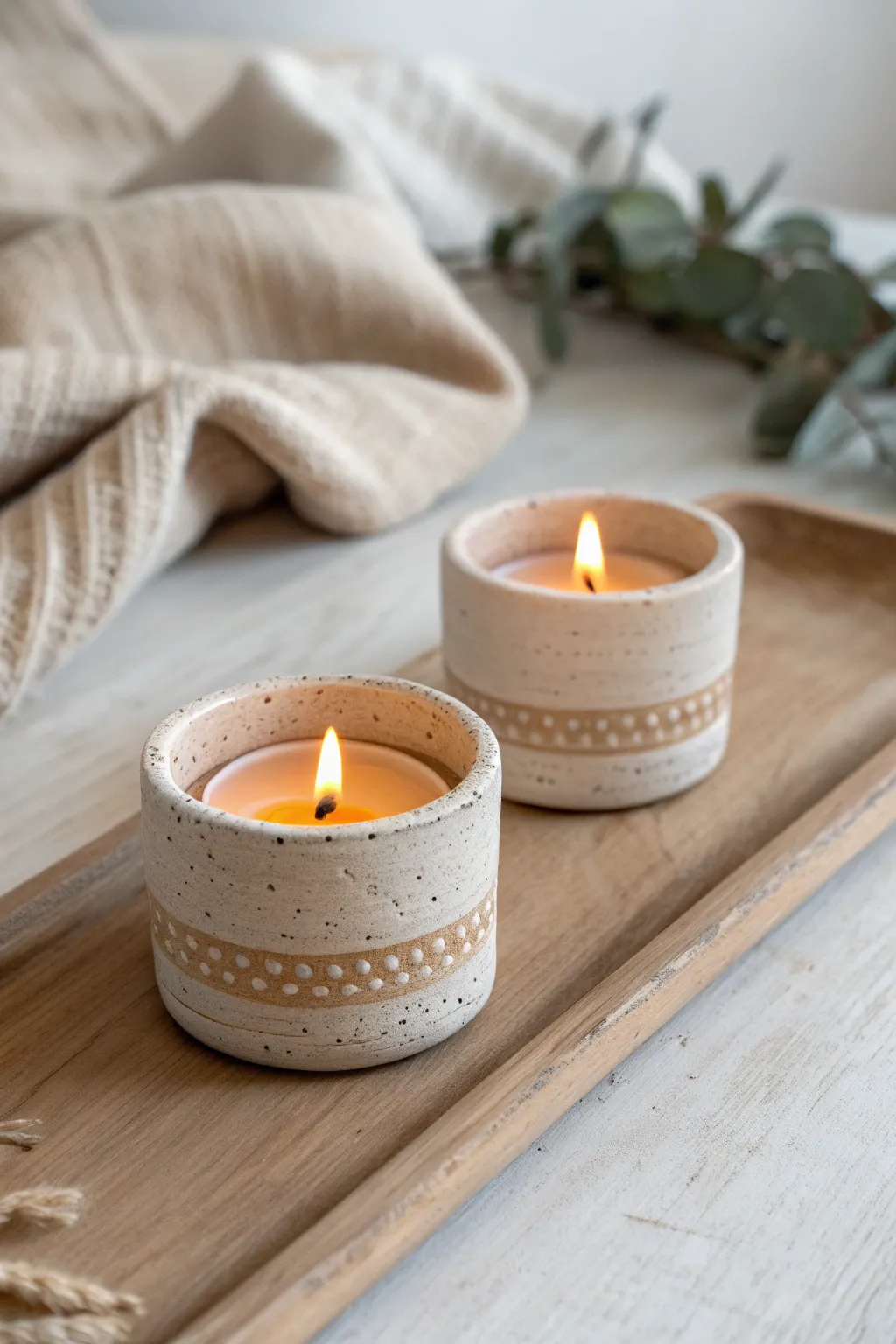 A tiny matching candle holder pair for an easy clay date night, warm glow and simple lines.