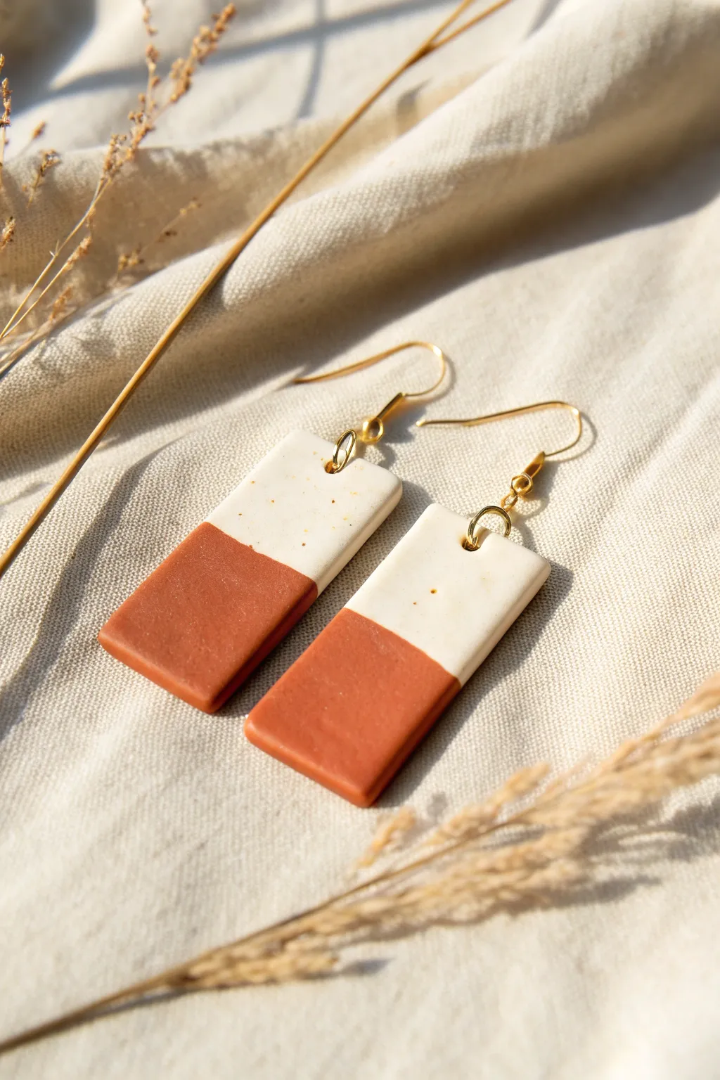 Crisp color-blocked clay drop earrings in soft neutrals, minimalist and boho chic.