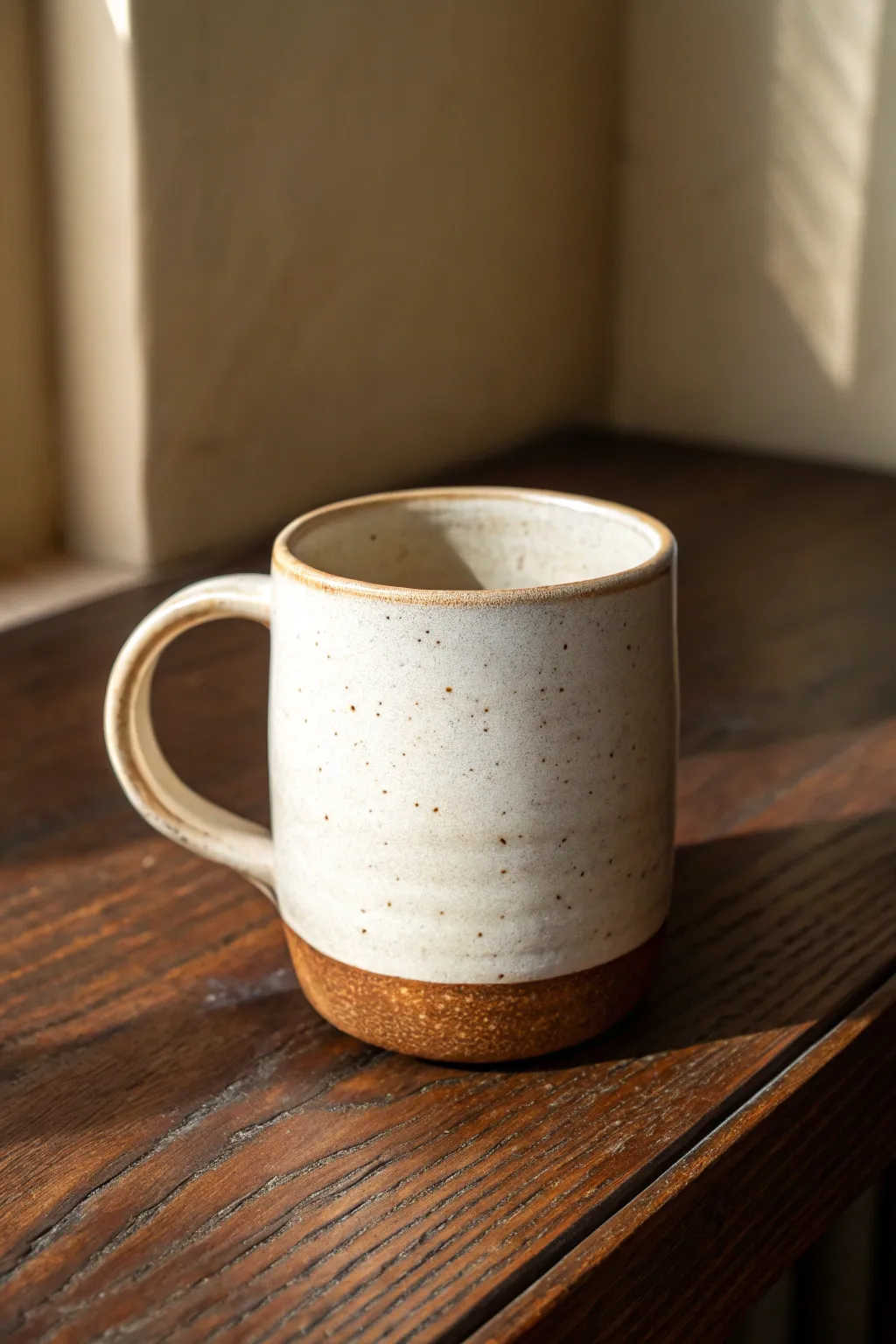 Soft rounded rim mug in simple glaze, a cozy minimalist upgrade that feels great to sip from.