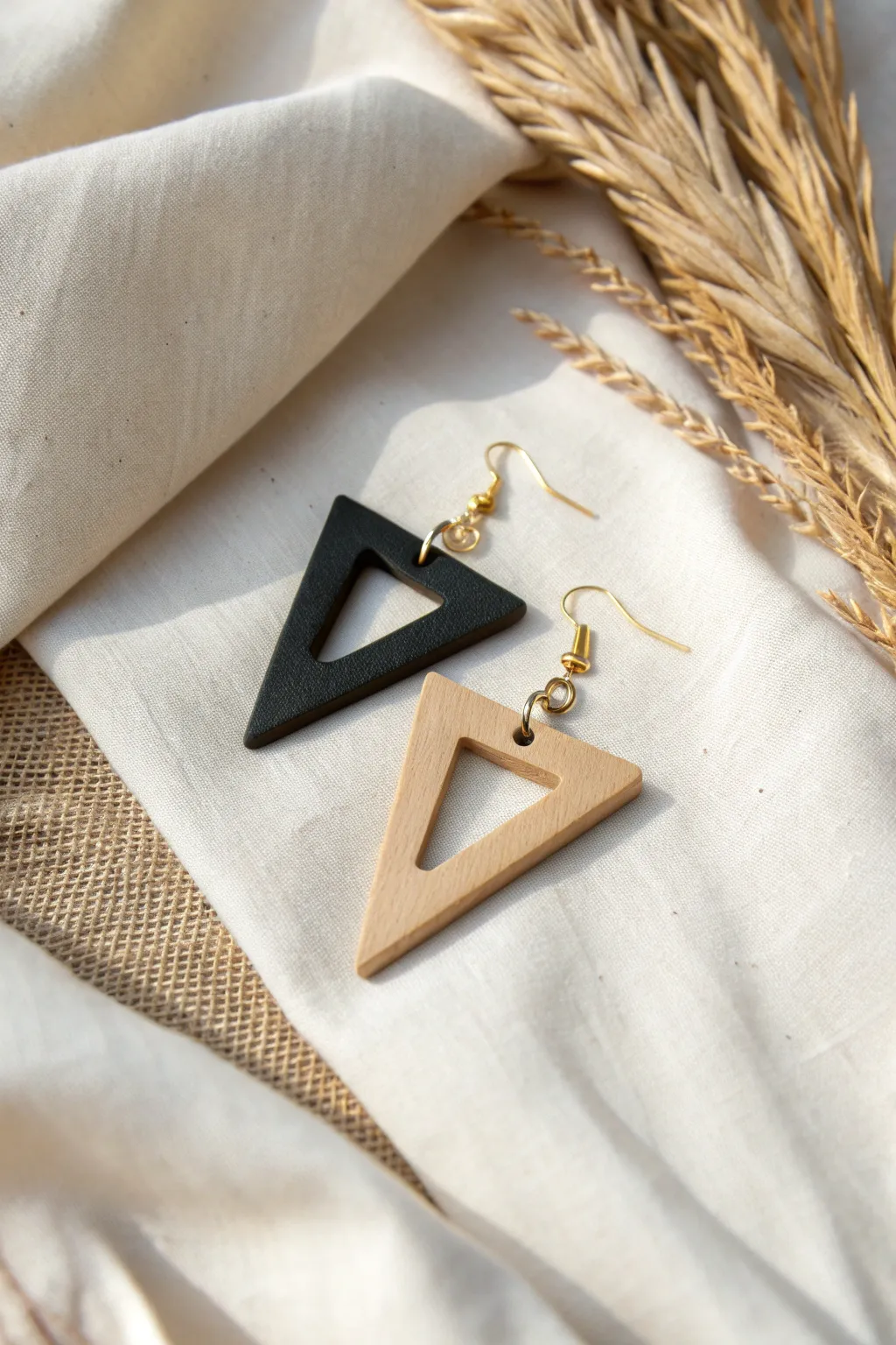 Simple triangle drop clay earrings in black and sand, clean lines, modern contrast, easy DIY.
