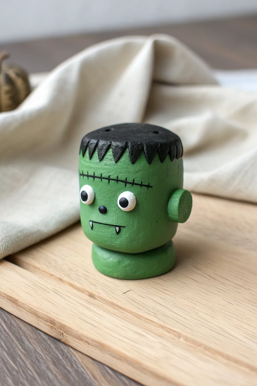 Cute Frankenstein mini clay heads for kids Halloween, simple, sweet, and easy to make.