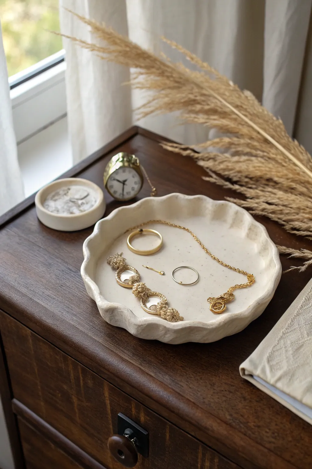 Soft wavy air dry clay tray that catches your everyday jewelry in calm, cozy style.