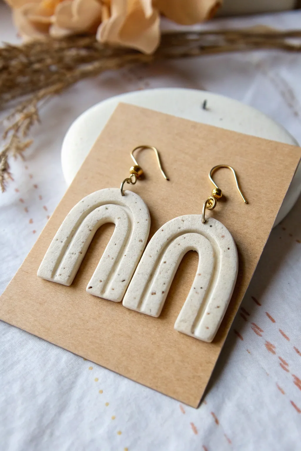 Simple arch clay earrings in soft neutrals, a chic beginner friendly project with handmade charm.