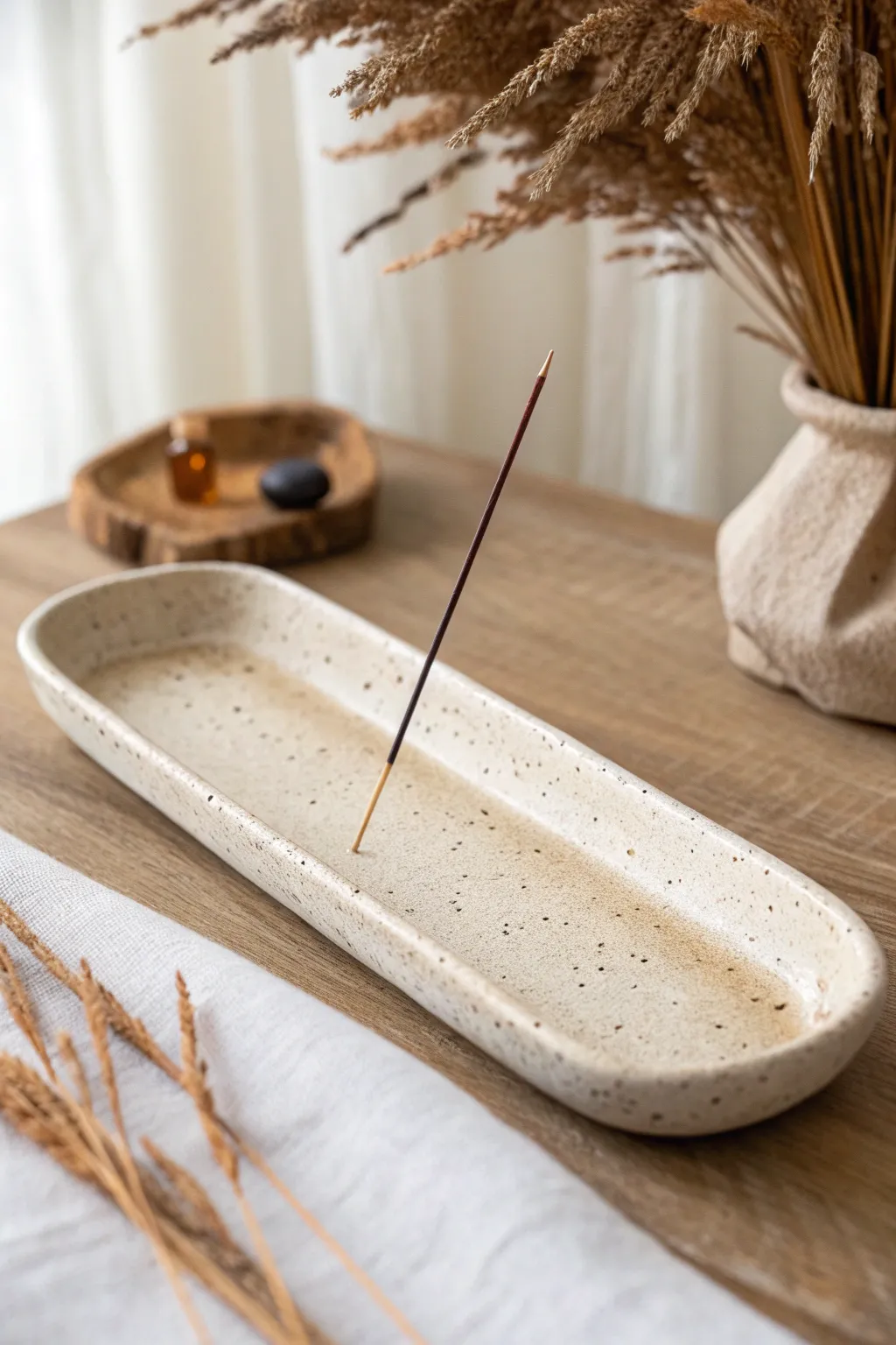 Minimal curved slab incense tray with pinched edges, a calm handmade touch for slow rituals.