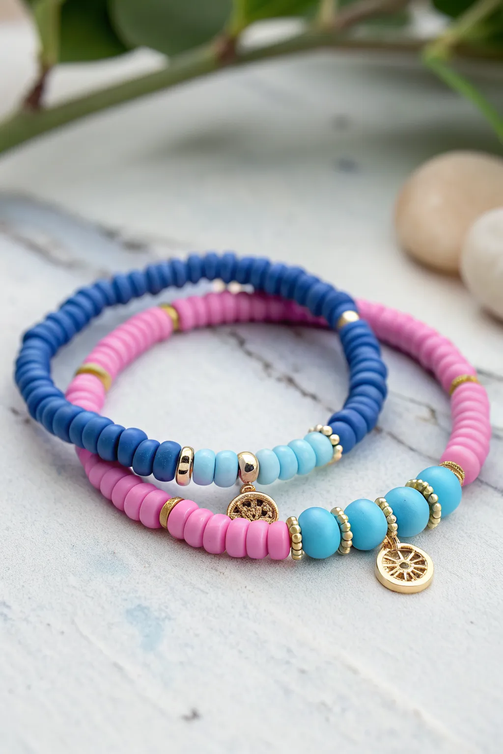 Besties bead bracelet set in Stitch blue and pink-lavender clay discs with subtle spacers.