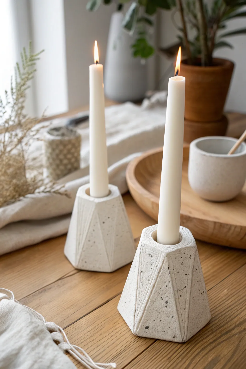 Simple white air dry clay taper holders with clean lines and soft shadows for a calm modern look