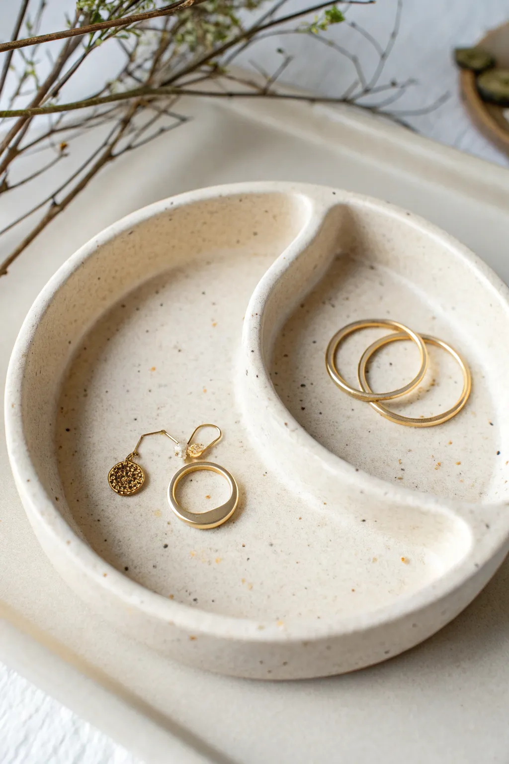 Yin-yang air dry clay holder with split compartments for rings and earrings, clean and calming