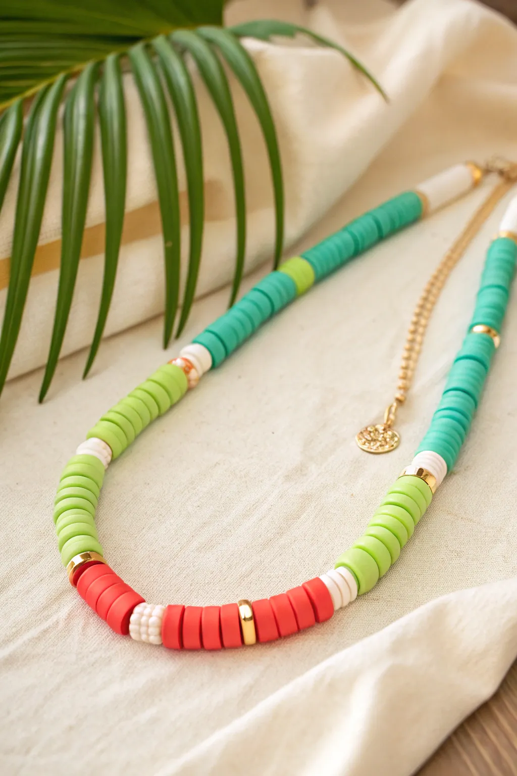 Tropical color-block clay heishi necklace with lime, turquoise, and coral summer vibes