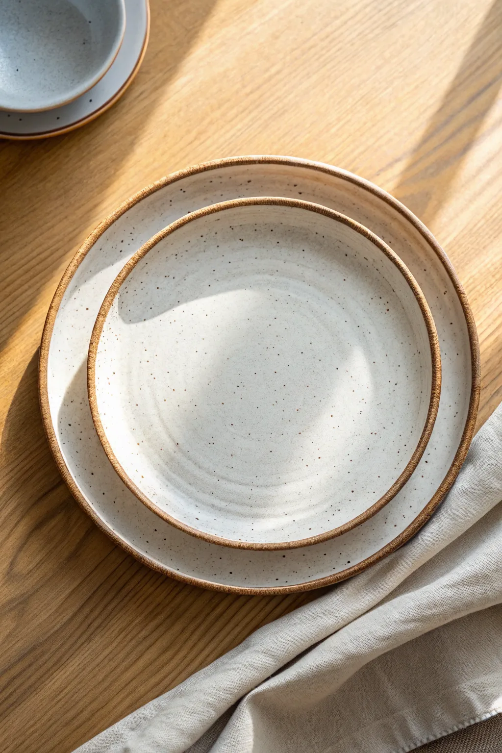 Simple wheel-thrown plate with a crisp rim, Scandinavian calm and handmade warmth for your table.