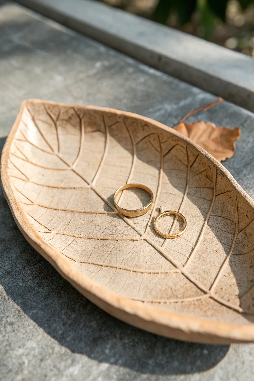 Leaf-imprint clay tray in earthy tones, a simple handmade catchall for rings and calm vibes