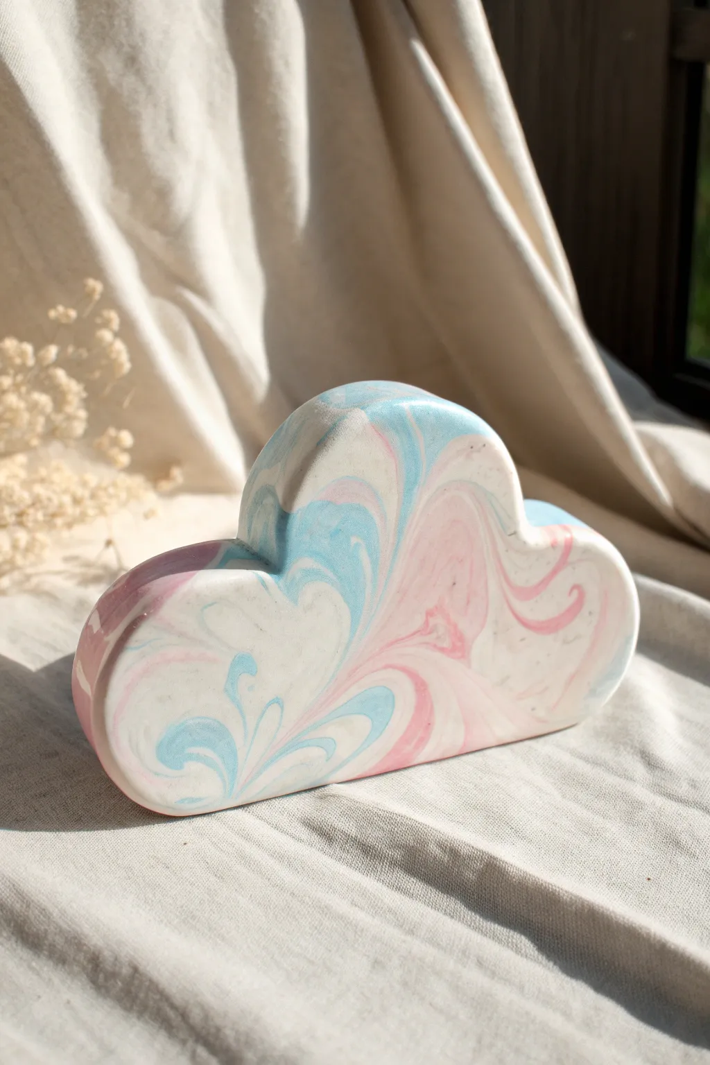 Pastel swirl cloud clay cloud with dreamy blue and pink marbling, matte and minimal.
