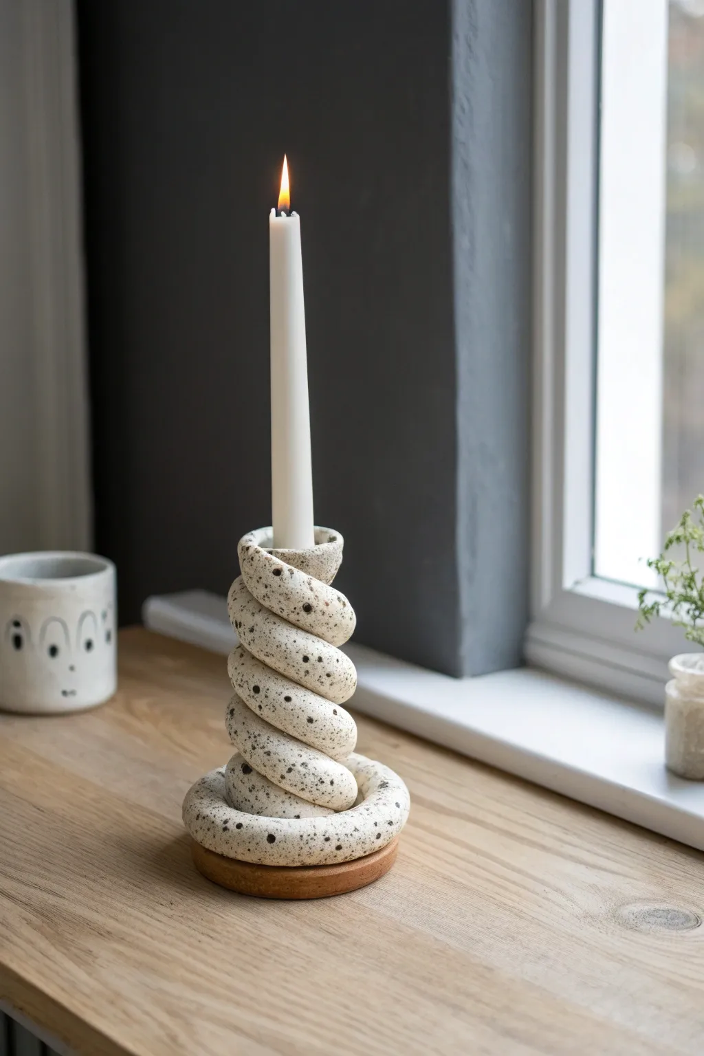 Playful wormy candle holder in matte clay a Scandinavian minimal piece with a boho giggle