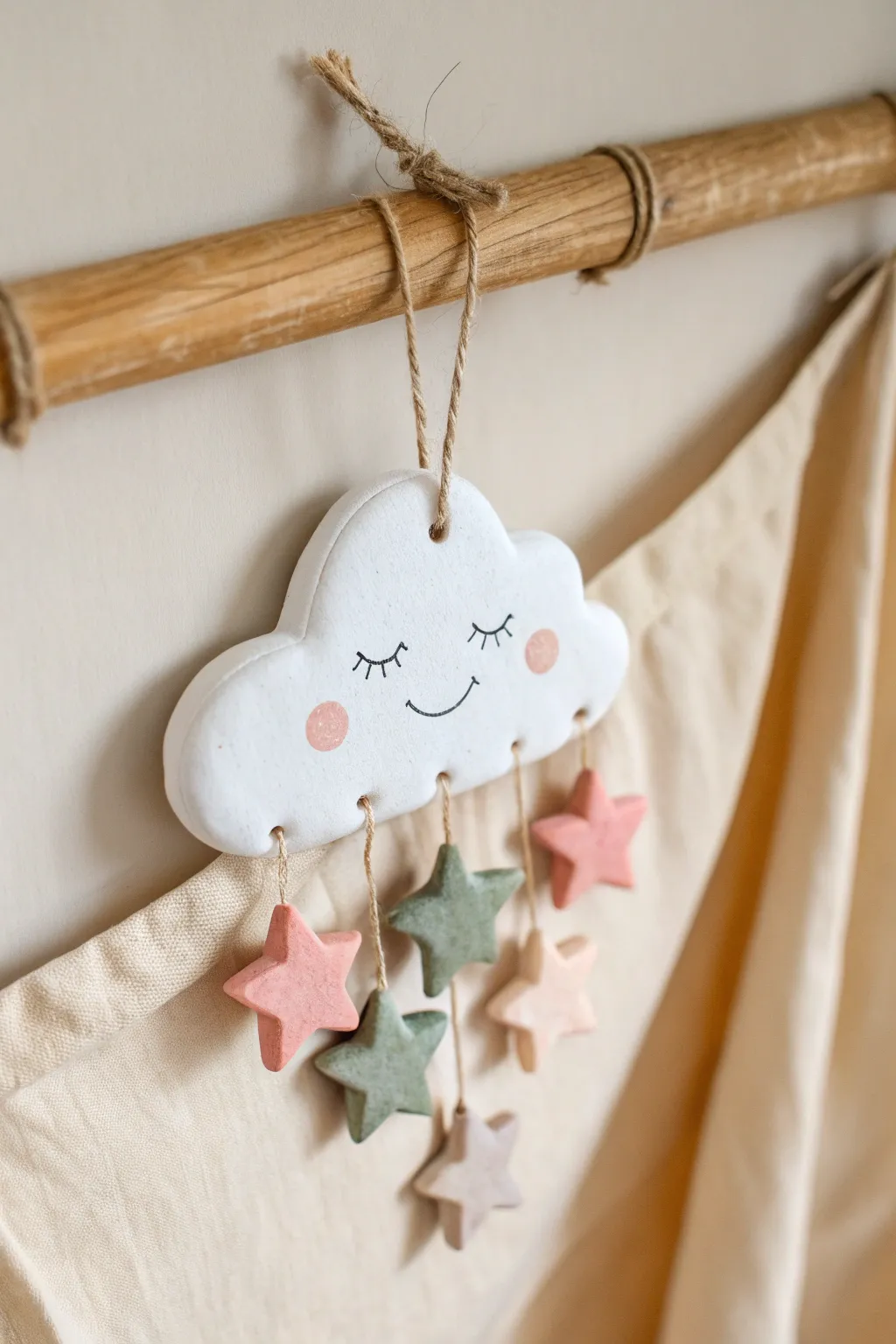 Sweet air dry clay cloud with pastel star dangles for a cozy minimalist boho wall.