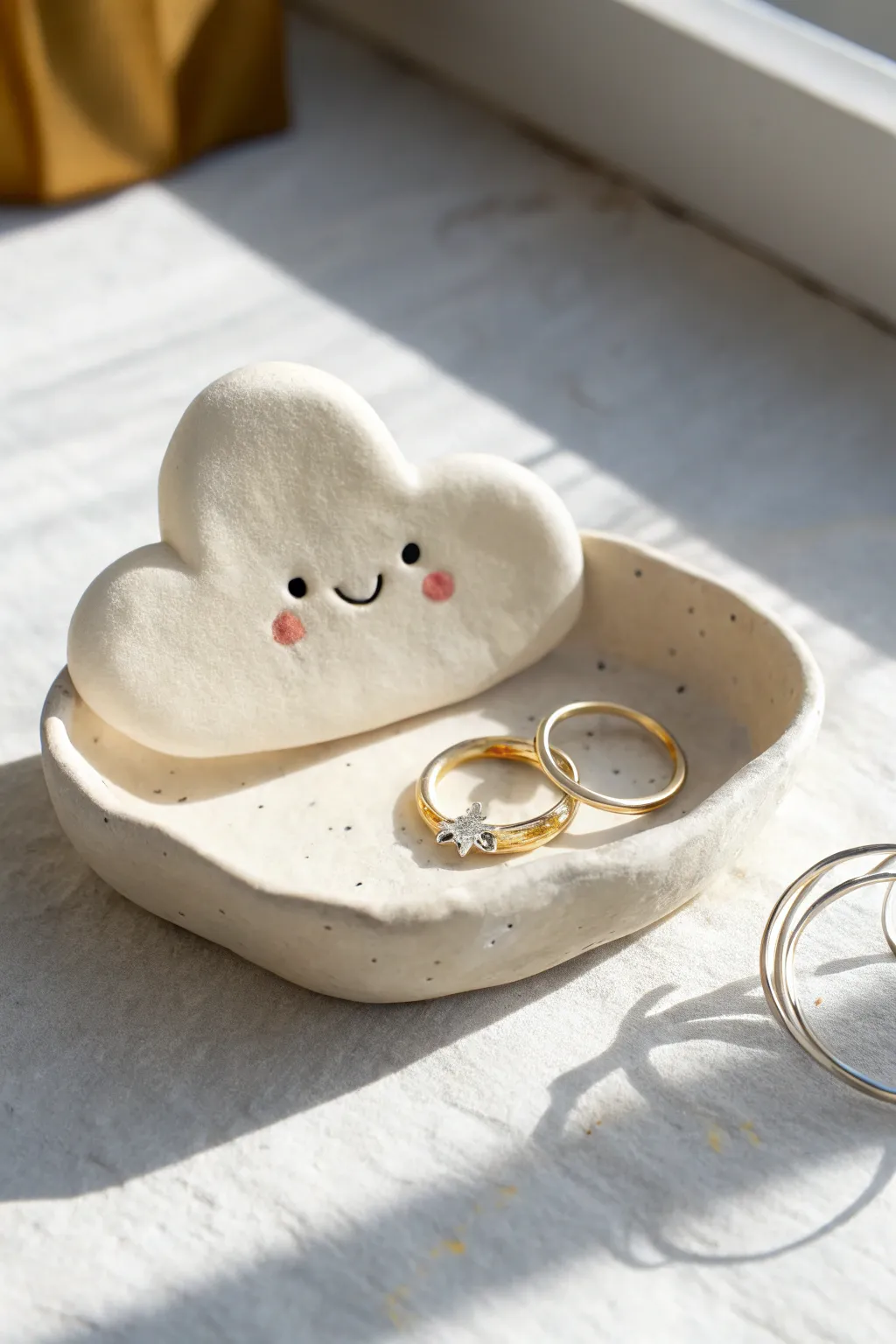 Little cloud ring holder made from air dry clay, a sweet minimalist catchall for your rings.