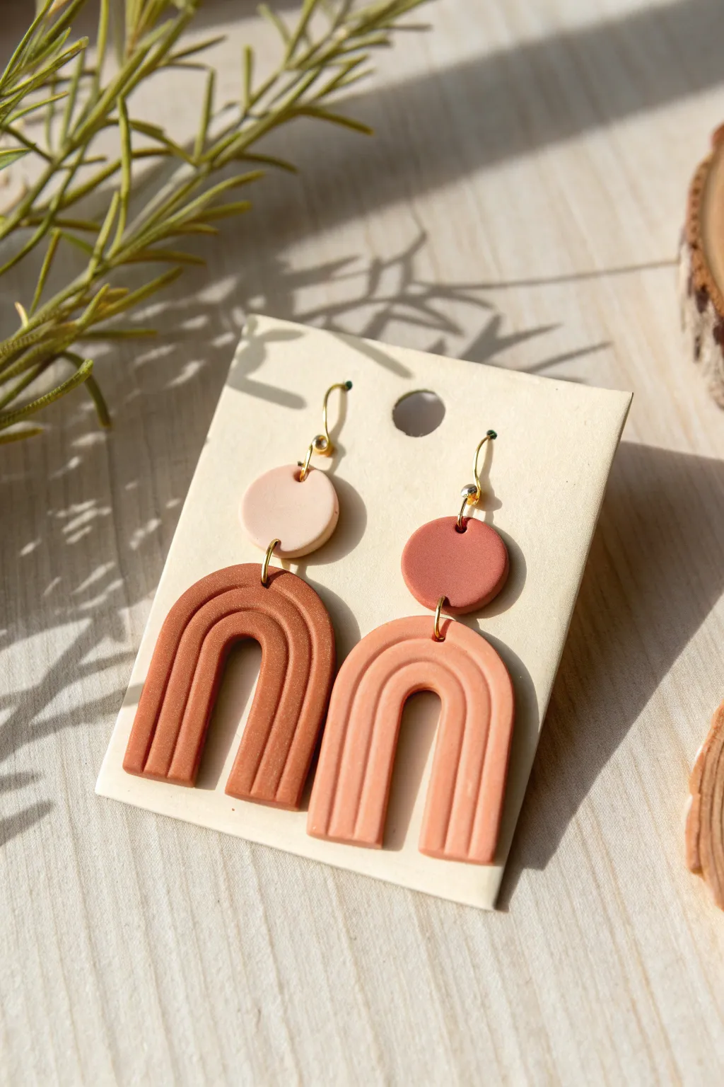 Minimal arch-and-circle polymer clay earrings on a blank card, perfect DIY statement gift.