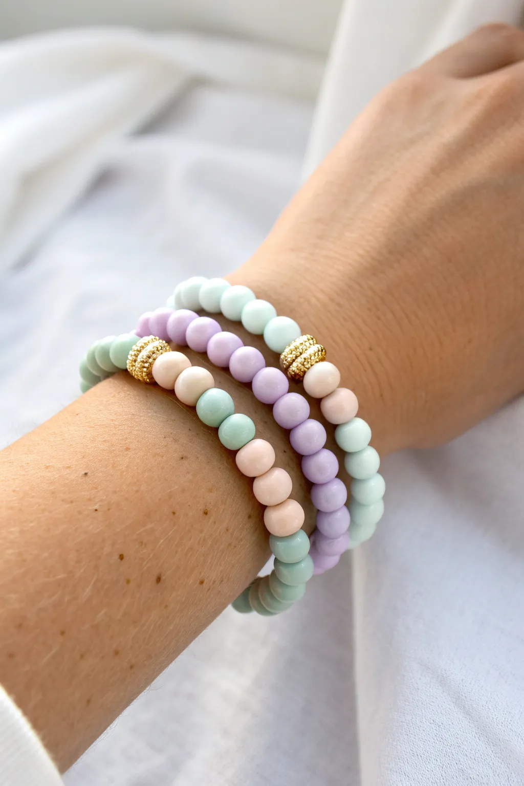 Classic pastel twin stack: matching clay bead bracelets in lavender, mint, and blush tones